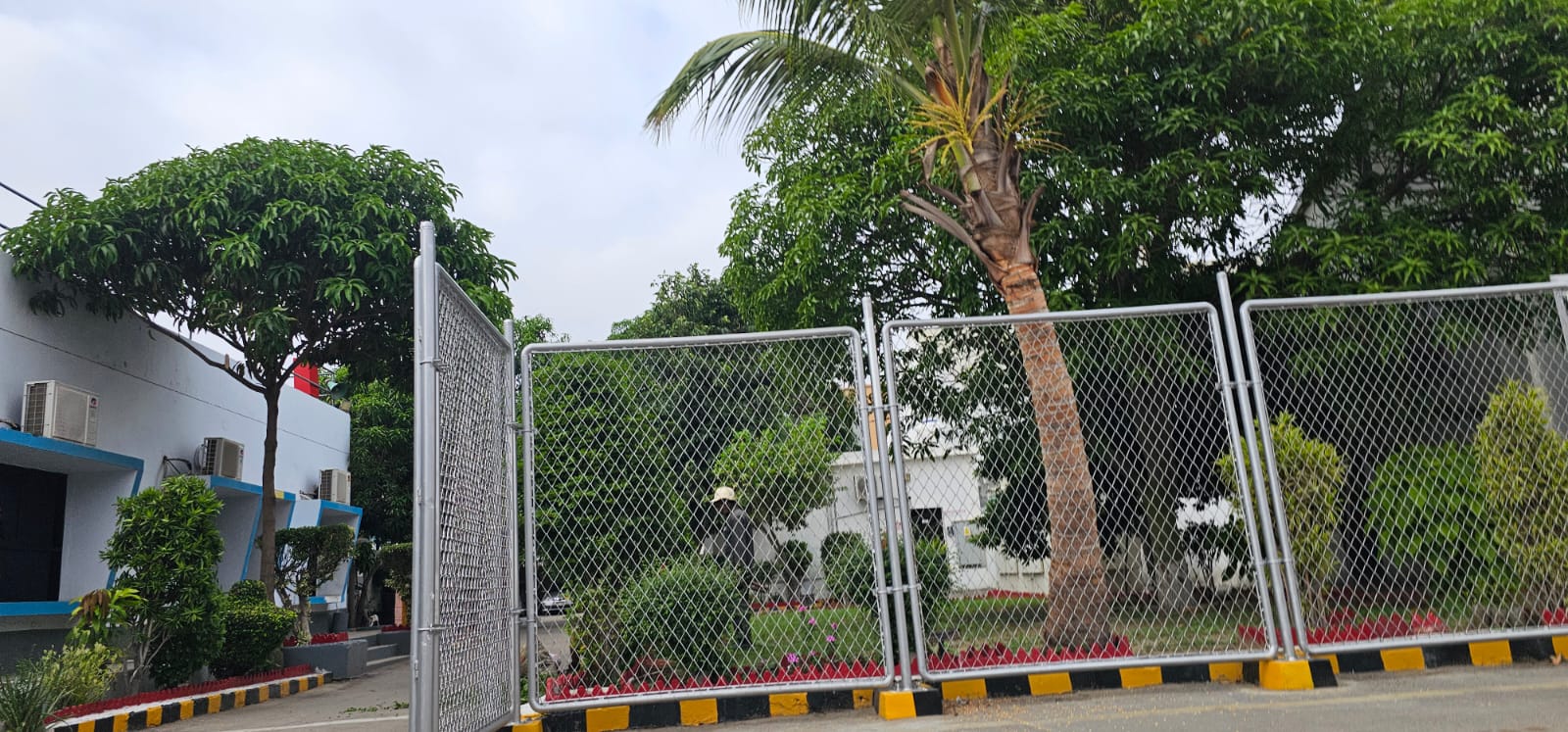 Galvanised chain-link fence panels and gates completed